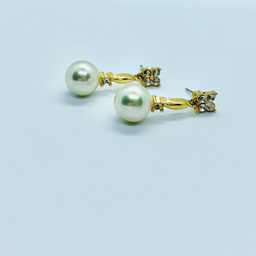 Dainty faux pearl drop earrings.